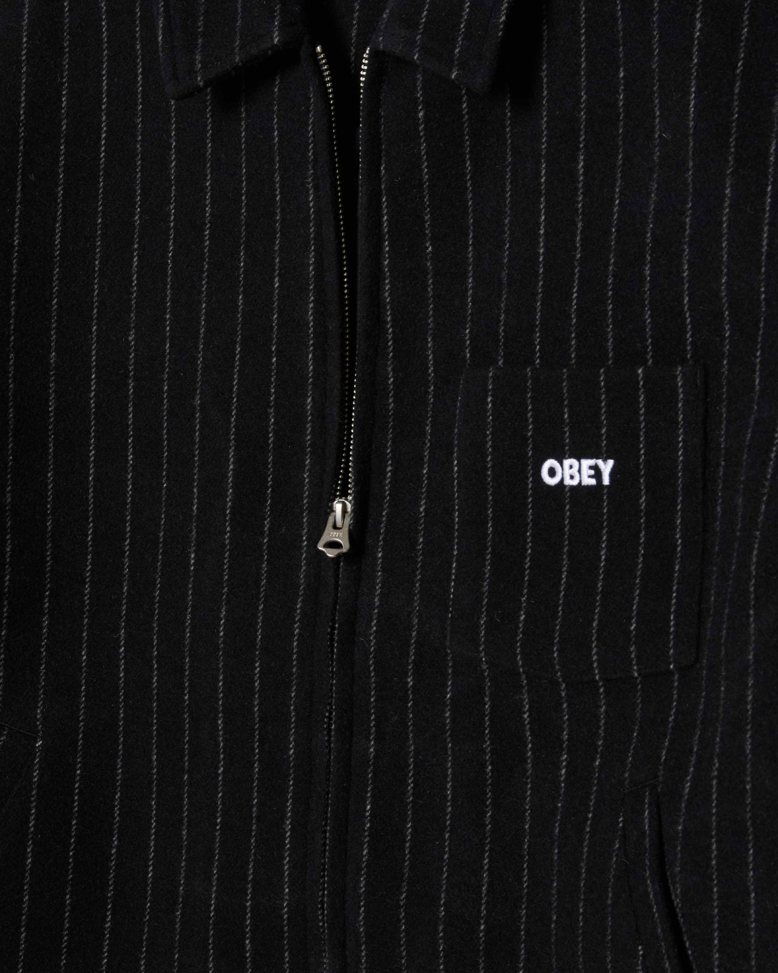 Black pinstripe jacket with 'OBEY' logo on a pocket